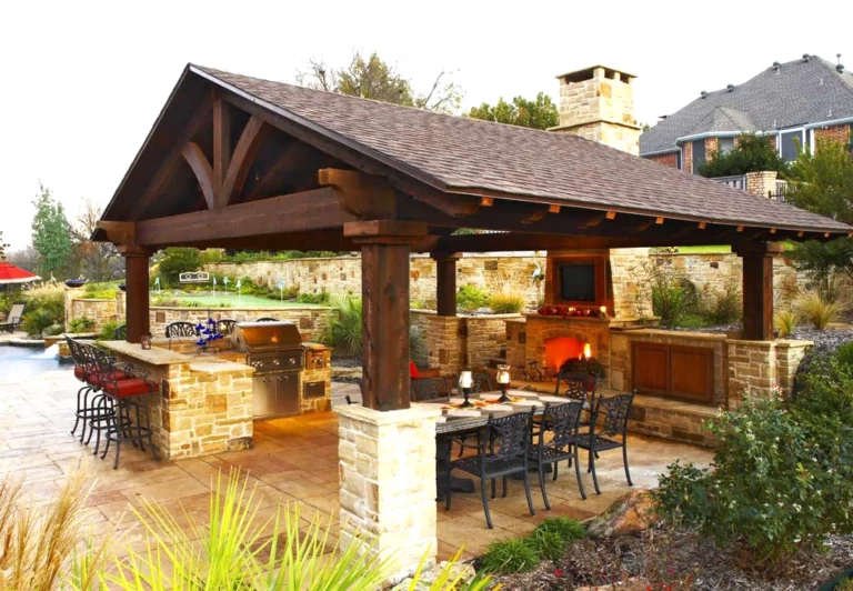 wooden pergola with outdoor kitchen