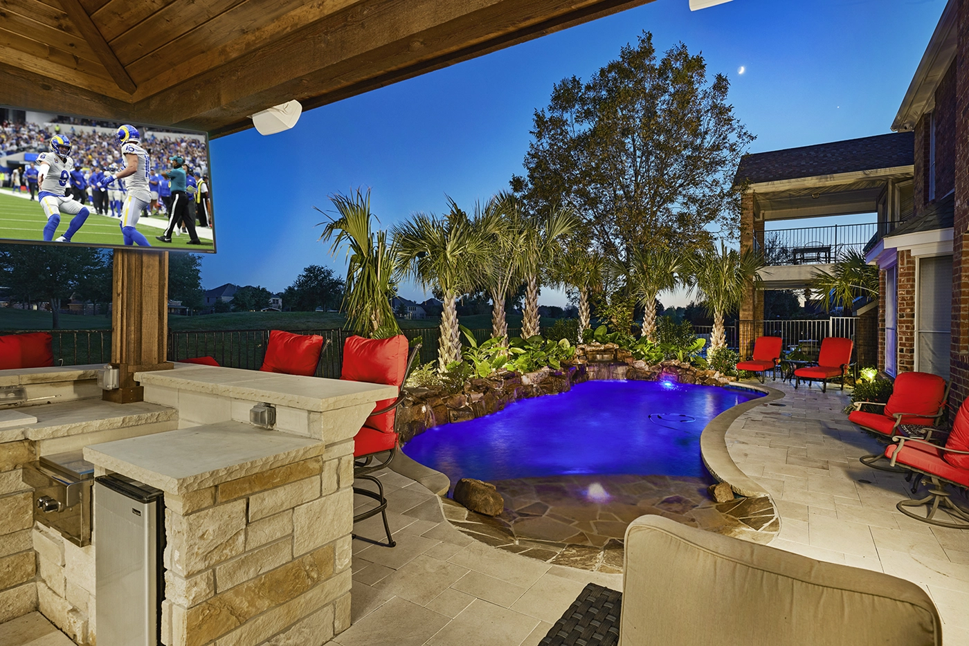 aerial view of pool and pool house