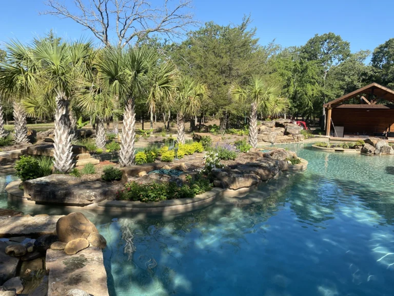 tropical landscaping by a pool